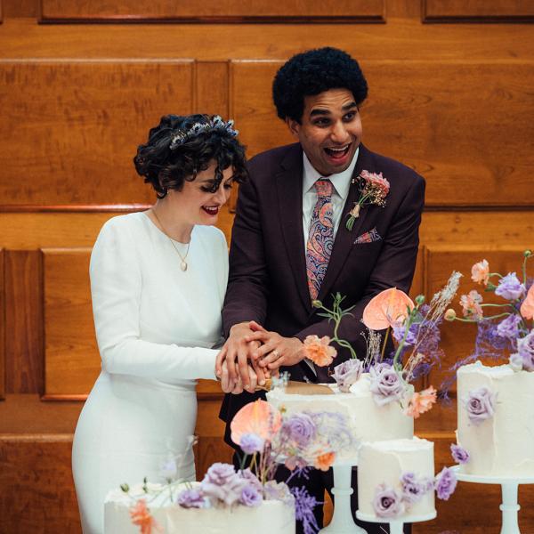 couple cutting their wedding cake 