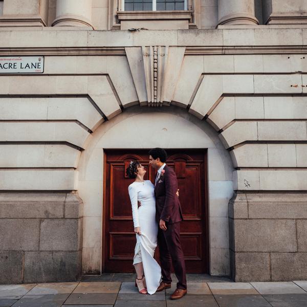 couple taking picture outside Lambeth Town Hall 