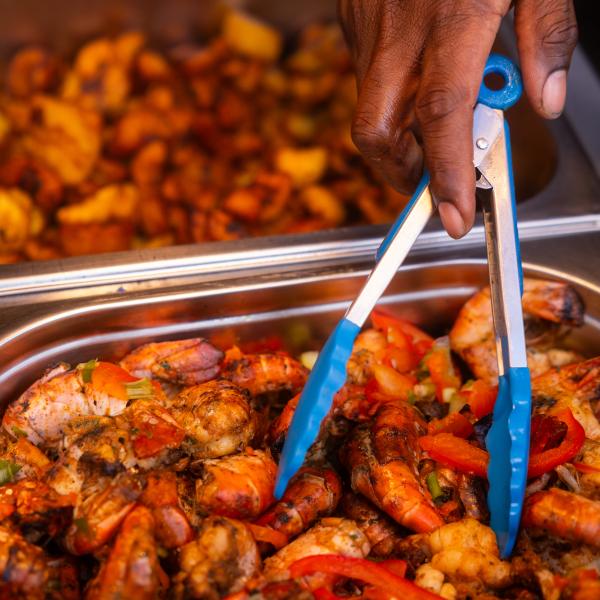 tray of prawns and chilli in dish for service